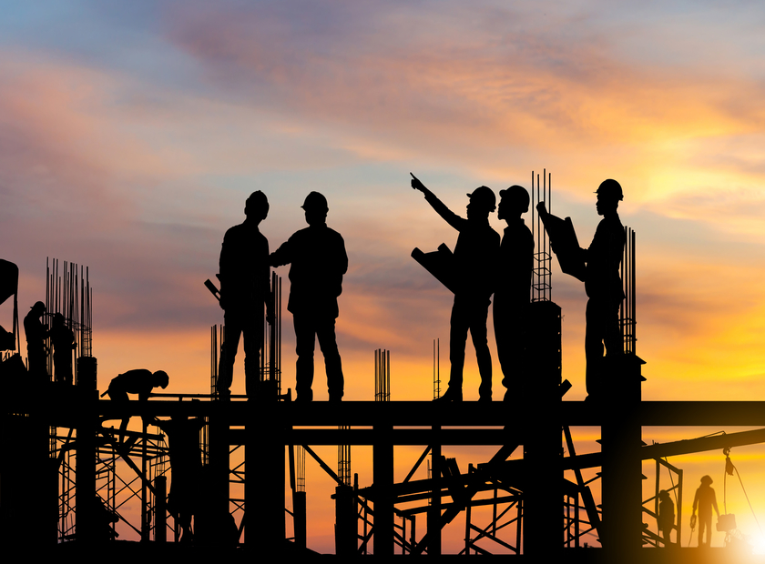 construction team at sunset